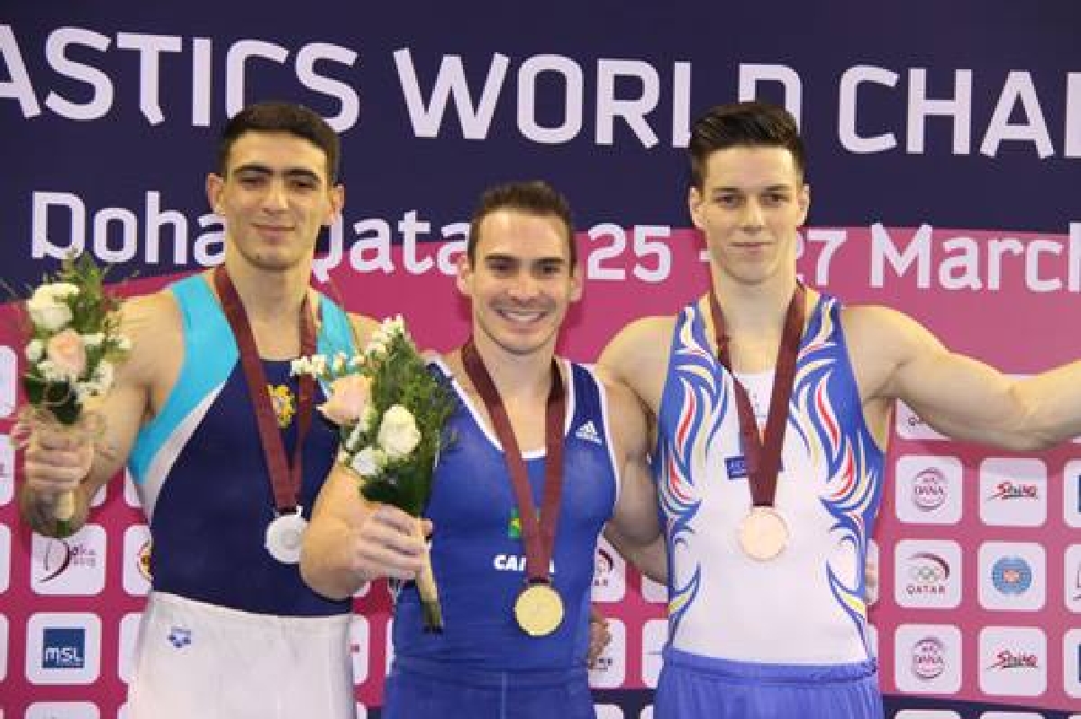 podiumul la inele la Doha, cu Andrei Muntean medaliat cu bronz