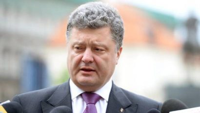 Preşedintele Ucrainei, Petro Poroşenko, afirmă că Vladimir Putin a început un război informaţional împotriva Germaniei