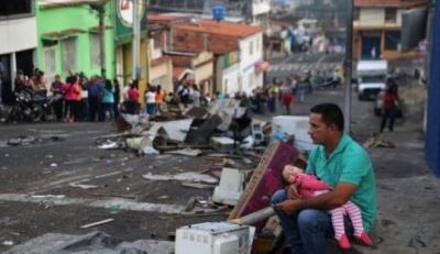 [VIDEO] „Jocurile foamei“ în Venezuela: magazine jefuite şi animale ucise